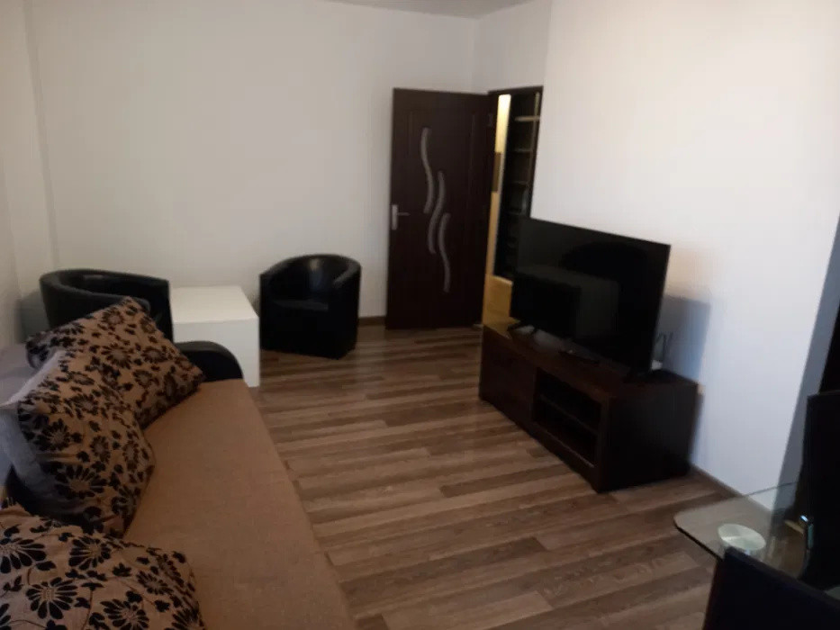 Apartament cu 2 camere,56mp,gradina privata, parcare, Zona Andrei Muresanu