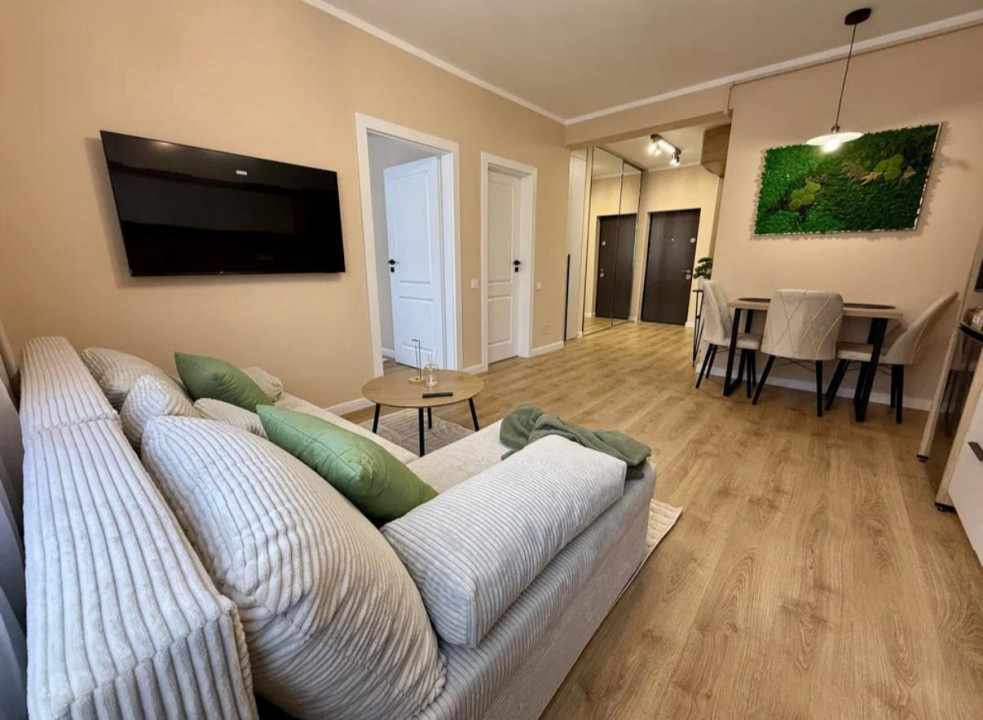 Apartament ultrafinisat,cu 2 camere si parcareetaj intermediar,zona Parc Poligon