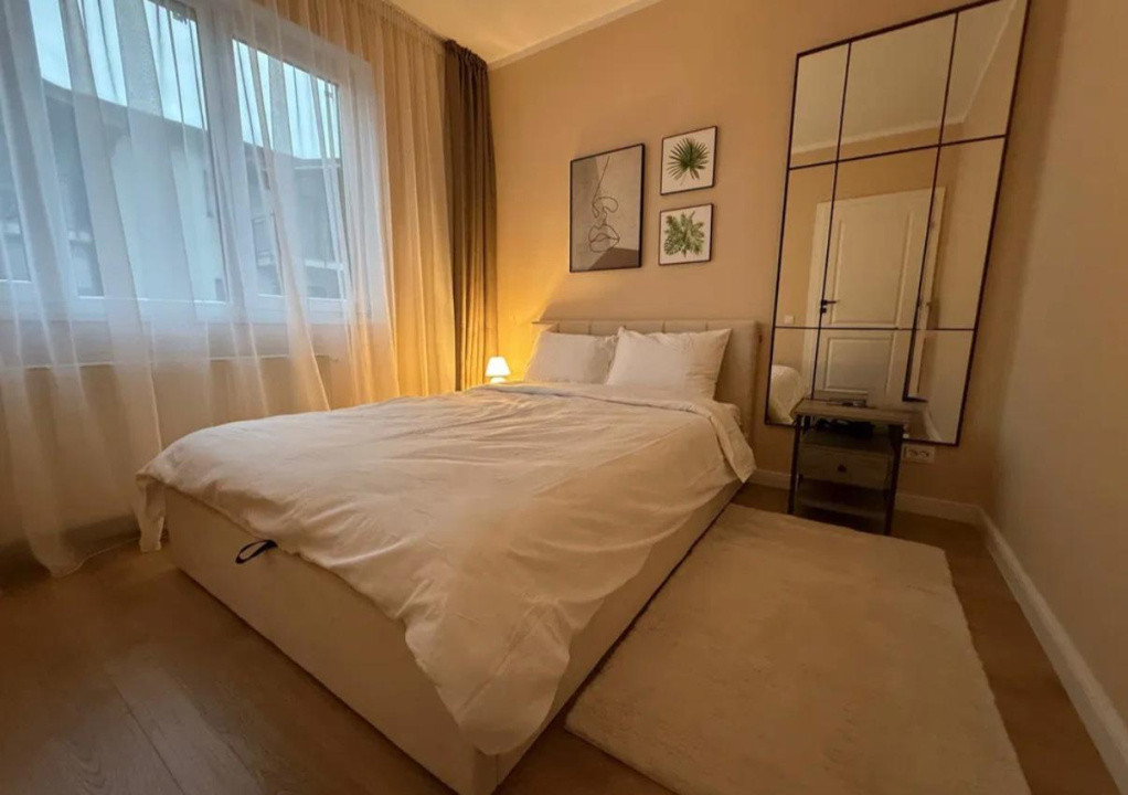 Apartament ultrafinisat,cu 2 camere si parcareetaj intermediar,zona Parc Poligon