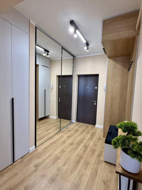 Apartament ultrafinisat,cu 2 camere si parcareetaj intermediar,zona Parc Poligon