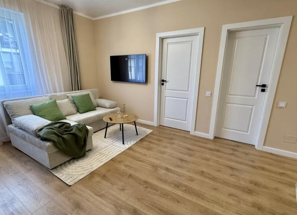 Apartament ultrafinisat,cu 2 camere si parcareetaj intermediar,zona Parc Poligon