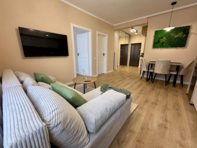 Apartament ultrafinisat,cu 2 camere si parcareetaj intermediar,zona Parc Poligon