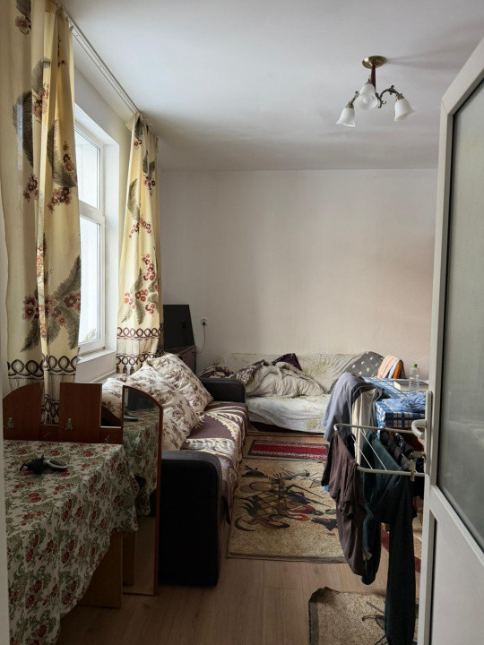 apartament la casa,cu o camera,parcare,gradina