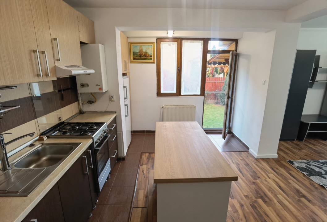 Apartament cu 2 camere, 47 mp, gradina de 49 mp, zona Terra