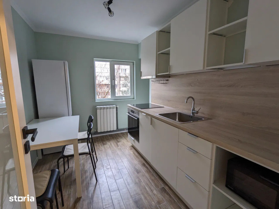 Apartament cu 3 camere, decomandat, 65 mp, 2 bai, etaj intemediar,zona Izlazului