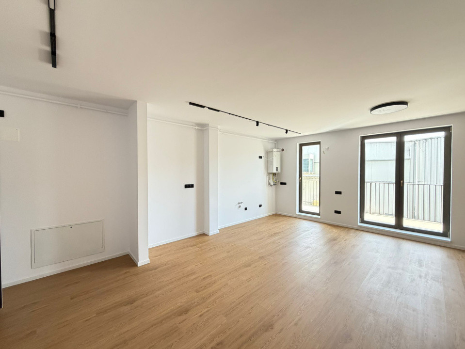Apartament cu 2 camere finisat, 53 mp, balcon, zona Eroilor
