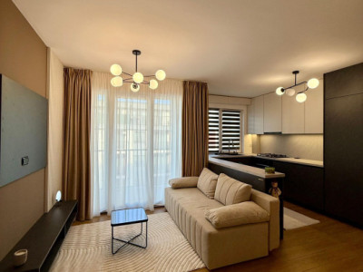 apartament cu 2 camere,2 bai,balcon,parcare,etaj intermediar,zona Parc Poligon