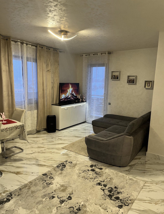 Apartament 59 mp utili+terasa de 18 mp,parcare subterana,centru Gilau