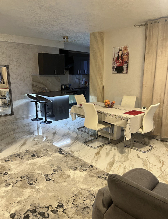 Apartament 59 mp utili+terasa de 18 mp,parcare subterana,centru Gilau