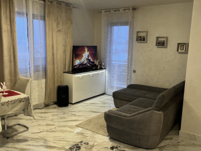 Apartament 59 mp utili+terasa de 18 mp,parcare subterana,centru Gilau