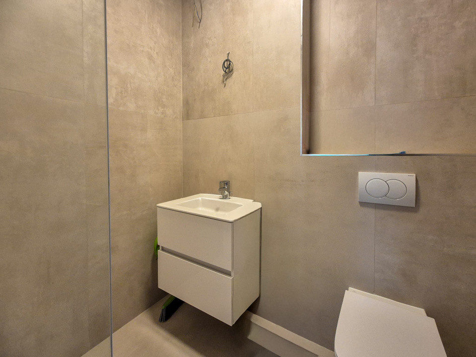 Apartament superfinisat 2 camere/Terasa 12mp /Garaj / strada Cetatii