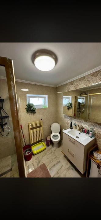 Casa individuala cu 3 camere,curte ded 300 mp