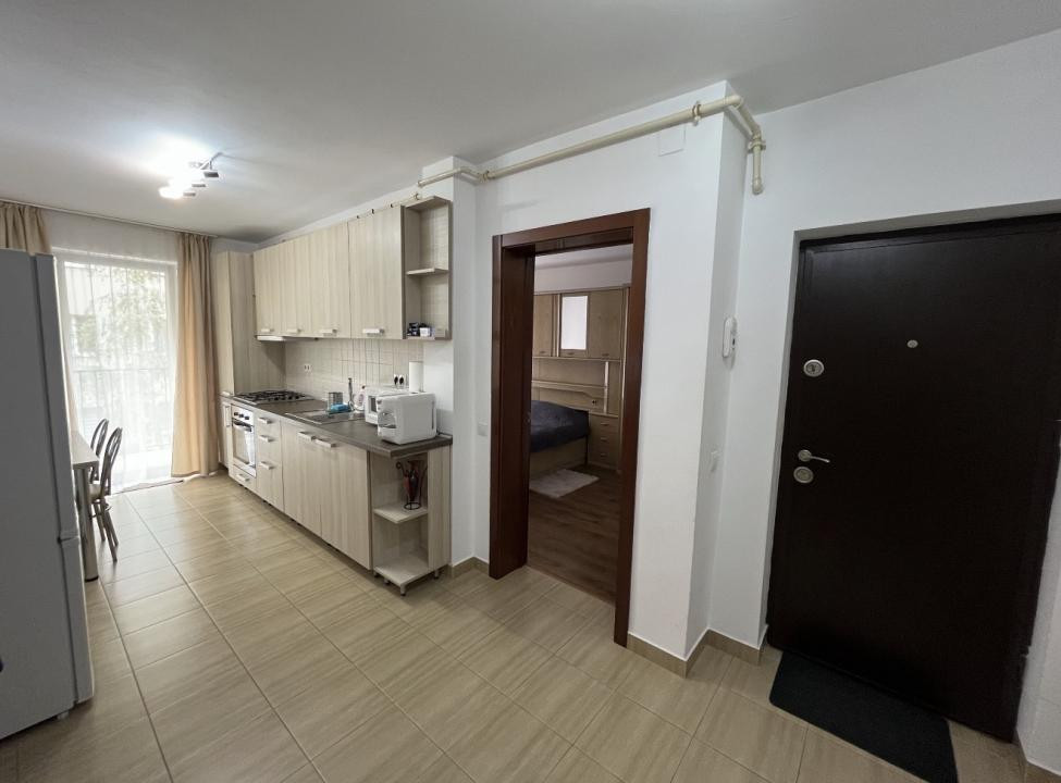 Apartament de 52 mp utili+balcon 10 mp,etaj intermediar,zona Florilor