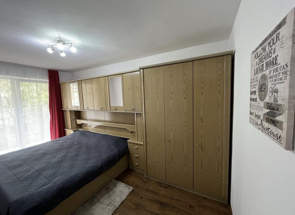 Apartament de 52 mp utili+balcon 10 mp,etaj intermediar,zona Florilor