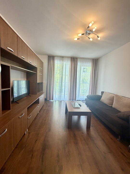 Apartament de 52 mp utili+balcon 10 mp,etaj intermediar,zona Florilor