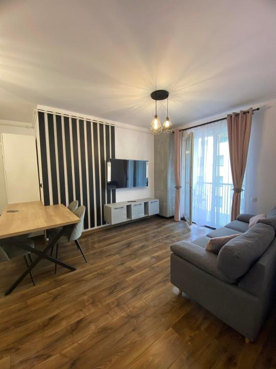 APARTAMENT CU 2 CAMERE,ETAJ INTERMEDIAR,PARCARE SUBTERANA,ZONA EROILOR