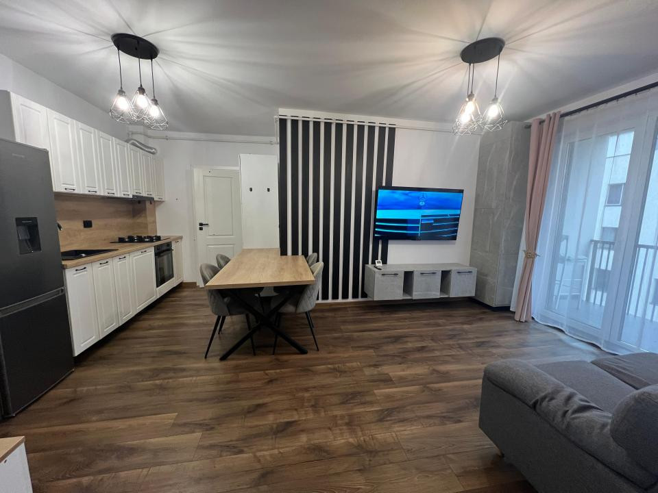 APARTAMENT CU 2 CAMERE,ETAJ INTERMEDIAR,PARCARE SUBTERANA,ZONA EROILOR