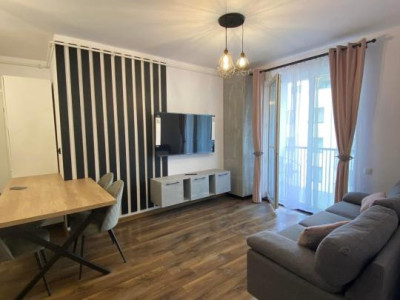 APARTAMENT CU 2 CAMERE,ETAJ INTERMEDIAR,PARCARE SUBTERANA,ZONA EROILOR