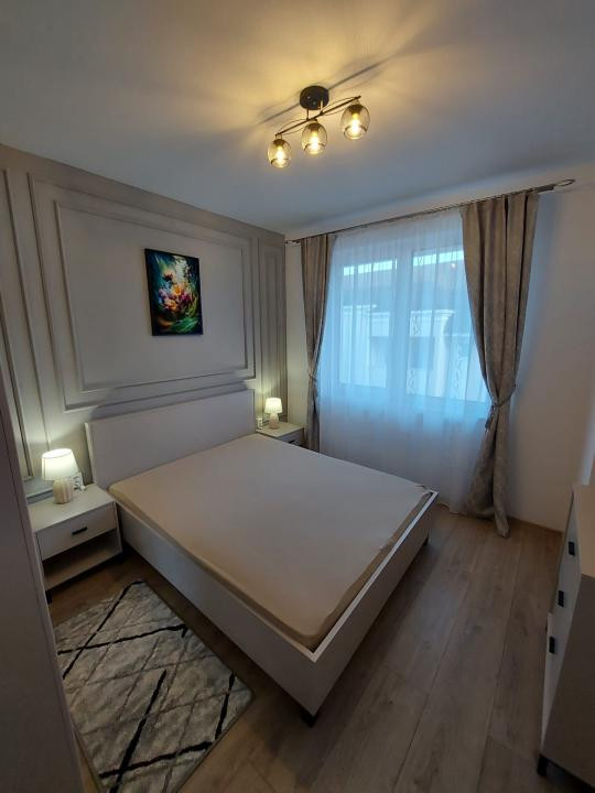 Apartament cu 3 camere,etaj intermediar,parcare subterana,zona  Cetatii