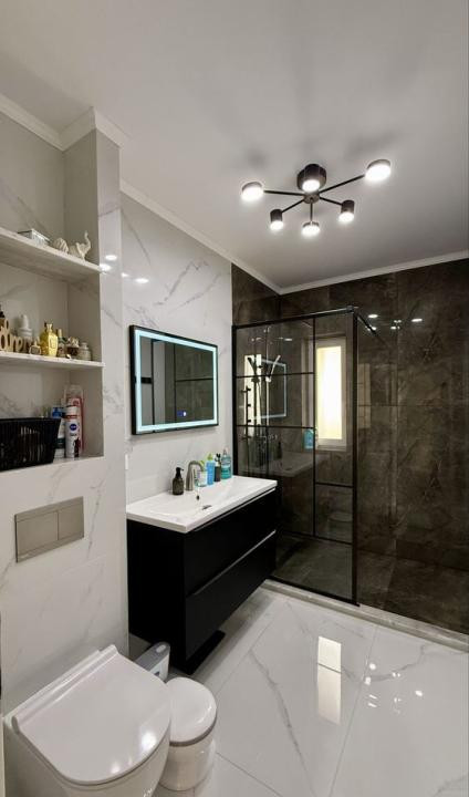 Apartament 72 mp utili,2 bai, 2 balcoane,etaj intermediar