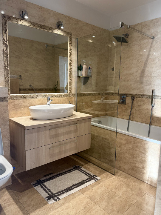 Apartament de 60 mp utili+2 balcoane, etaj 1,parcare,zona Kik