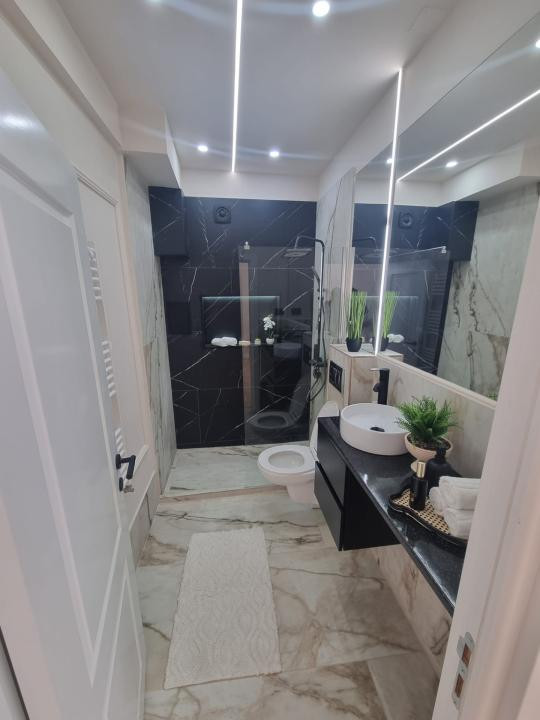 Apartament cu 2 camere,ultrafinisat ,zona centrală 