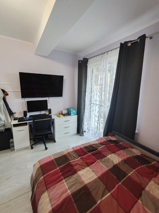 Apartament cu 3 camere,parcare,etaj intermediar