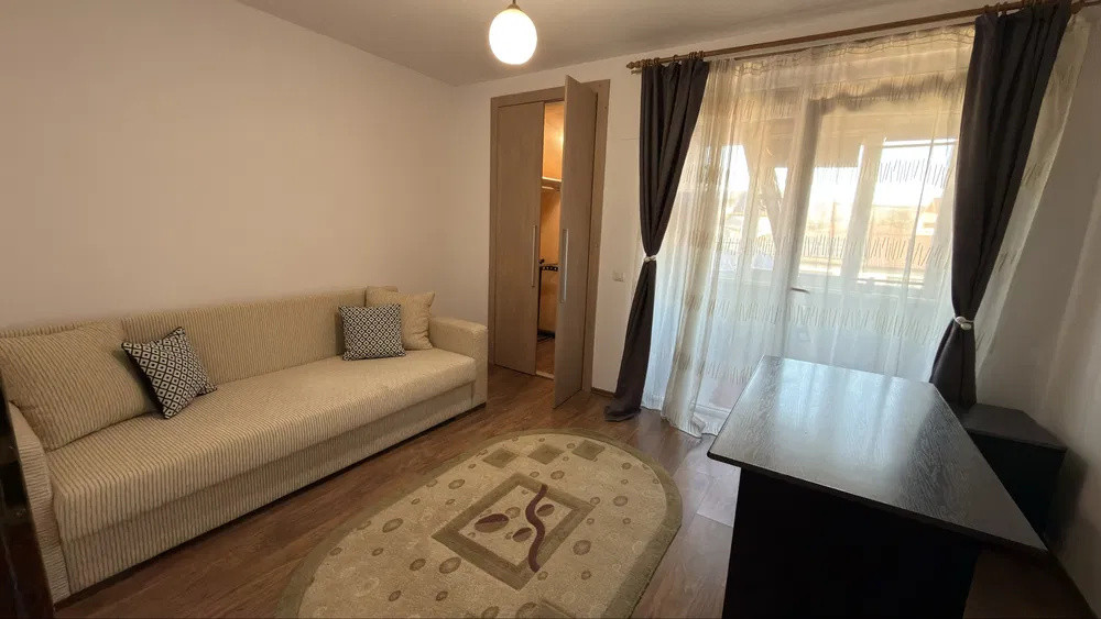 Apartament 3 camere, suprafata utila 71 mp, cu loc de parcare.