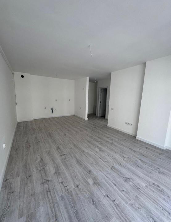 Apartament cu  2camere,finisat,etaj intermediar,parcare,zona Eroilor