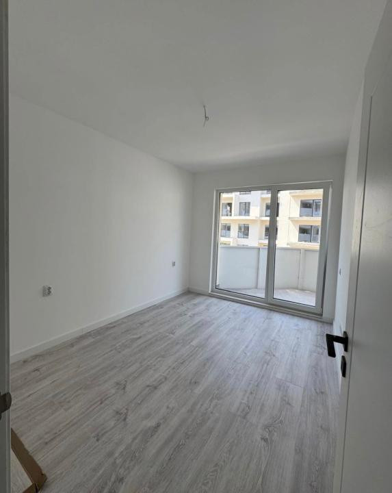 Apartament cu  2camere,finisat,etaj intermediar,parcare,zona Eroilor