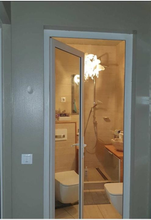 Apartament cu 3 camere,parcare,etaj intermediar,zona Stadionului