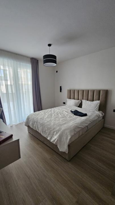 Apartament modern, suprafata utila 75 mp + 82mp terasa, cu 2 locuri  de parcare 