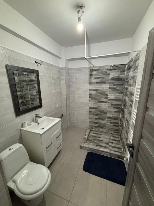 Aparrtament de 51 mp utili,parcare,bloc nou cu lift ,zona Terra
