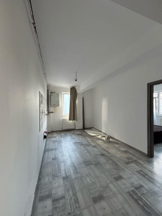 Aparrtament de 51 mp utili,parcare,bloc nou cu lift ,zona Terra
