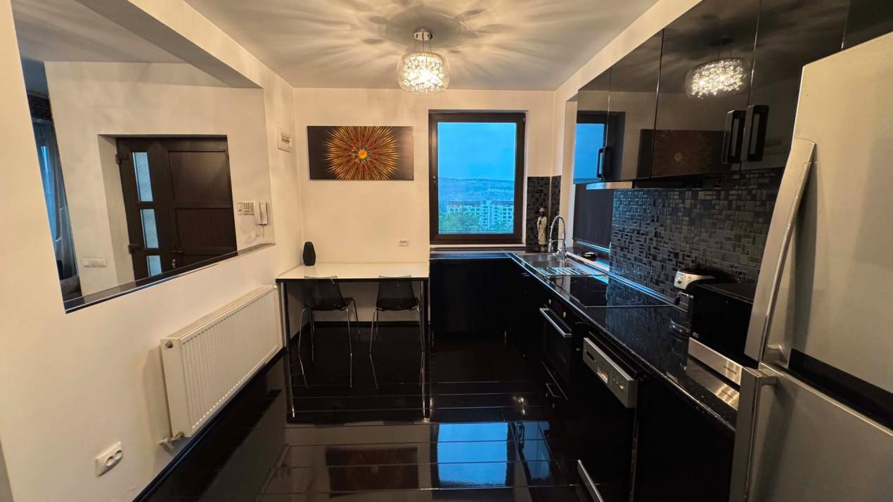 CASA INDIVIDUALA DE INCHIRIAT CU 4 CAMERE,CURTE 500 MP,GARAJ,ZONA VIVO