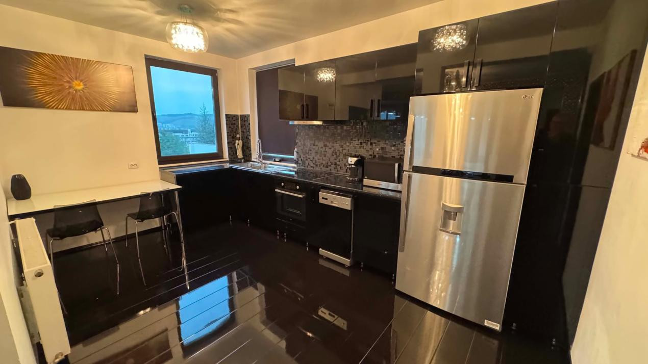CASA INDIVIDUALA DE INCHIRIAT CU 4 CAMERE,CURTE 500 MP,GARAJ,ZONA VIVO