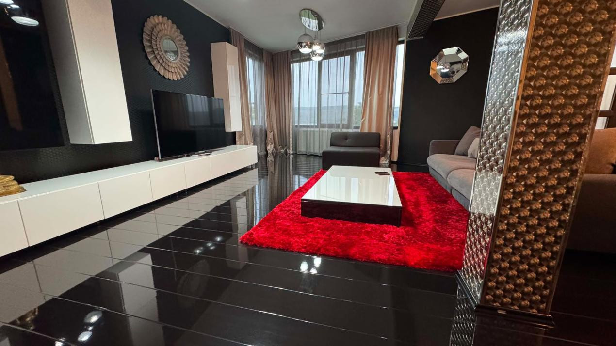 CASA INDIVIDUALA DE INCHIRIAT CU 4 CAMERE,CURTE 500 MP,GARAJ,ZONA VIVO