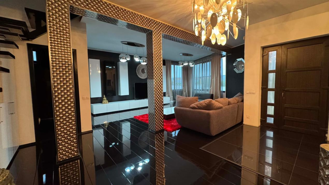 CASA INDIVIDUALA DE INCHIRIAT CU 4 CAMERE,CURTE 500 MP,GARAJ,ZONA VIVO
