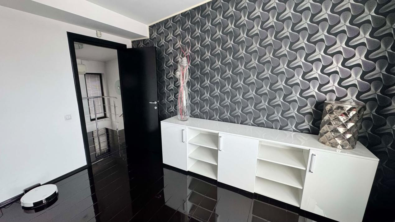 CASA INDIVIDUALA DE INCHIRIAT CU 4 CAMERE,CURTE 500 MP,GARAJ,ZONA VIVO