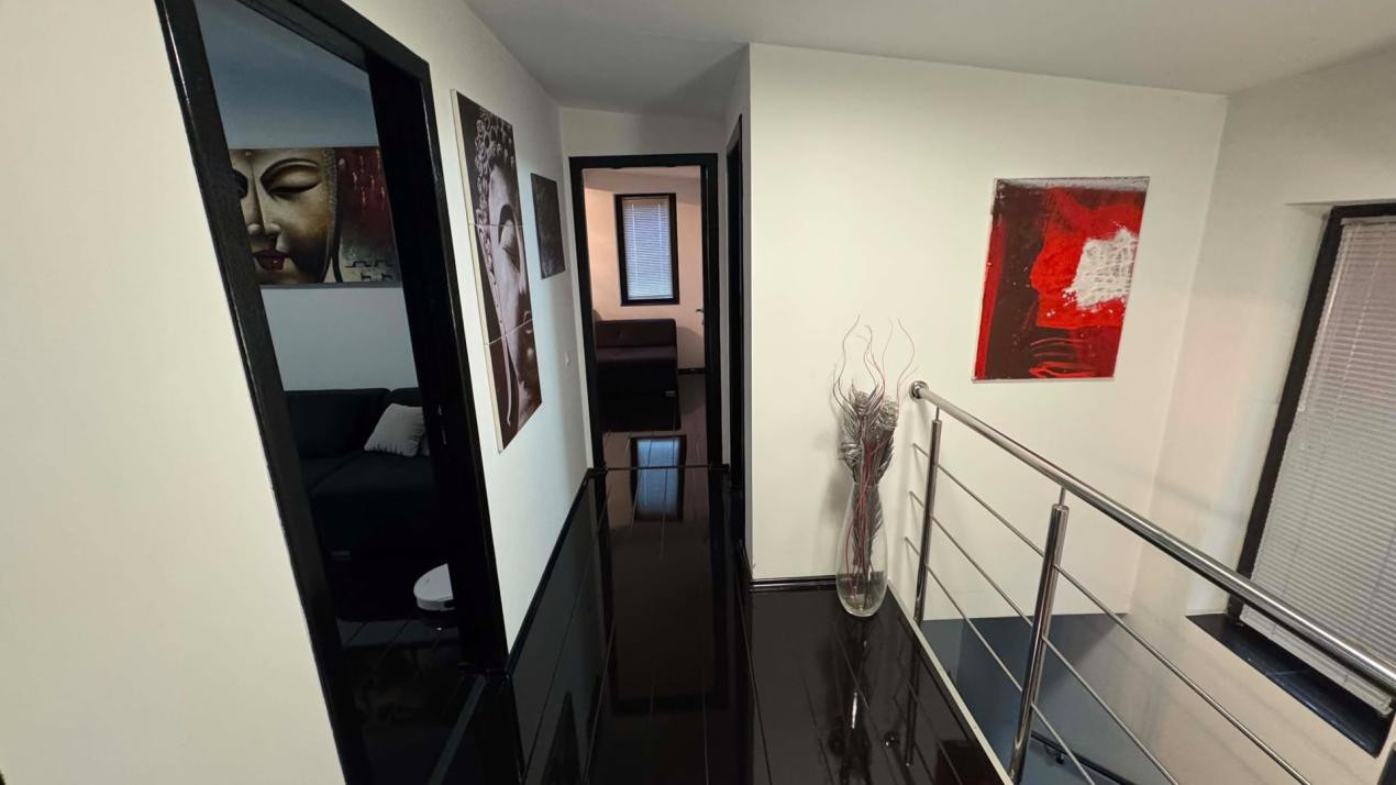CASA INDIVIDUALA DE INCHIRIAT CU 4 CAMERE,CURTE 500 MP,GARAJ,ZONA VIVO