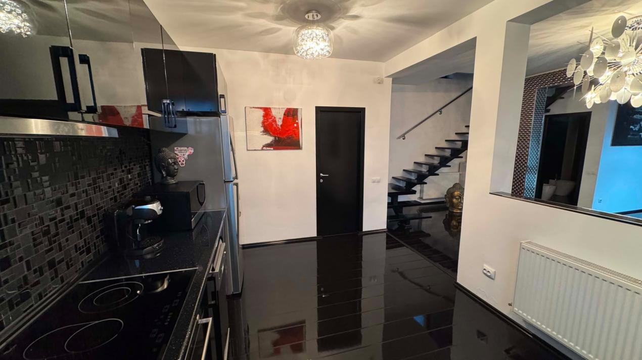 CASA INDIVIDUALA DE INCHIRIAT CU 4 CAMERE,CURTE 500 MP,GARAJ,ZONA VIVO