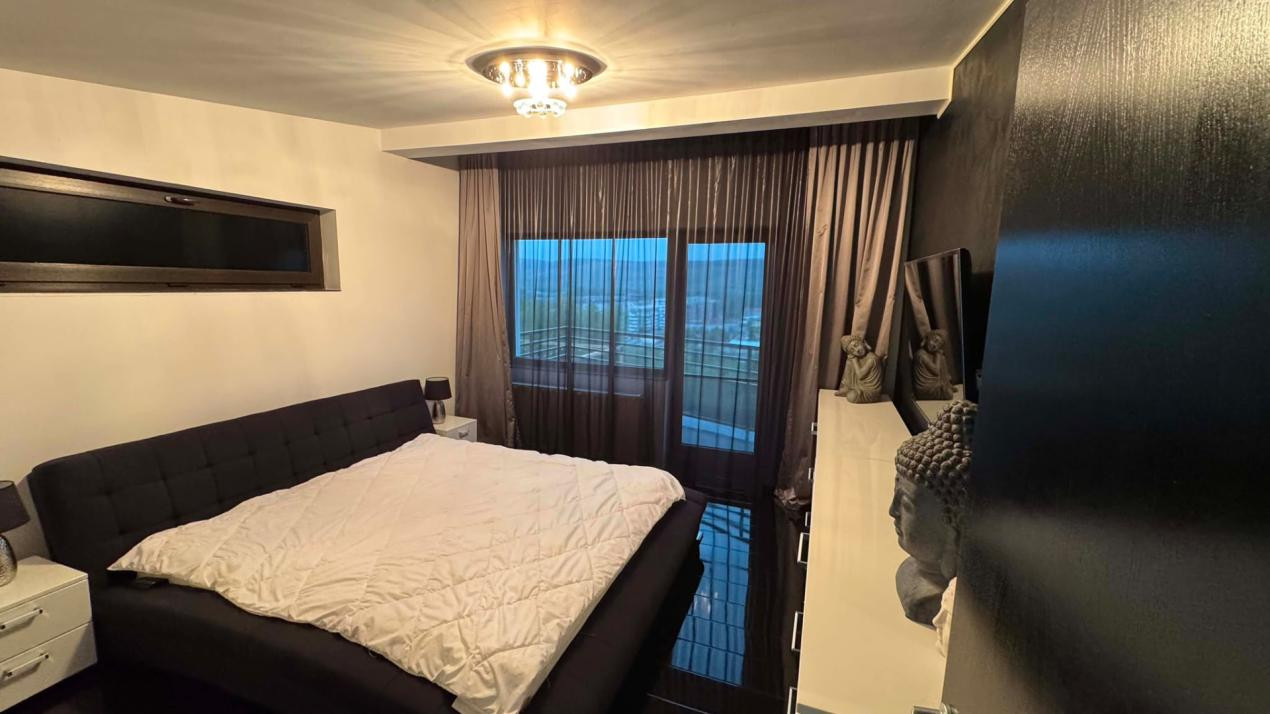 CASA INDIVIDUALA DE INCHIRIAT CU 4 CAMERE,CURTE 500 MP,GARAJ,ZONA VIVO