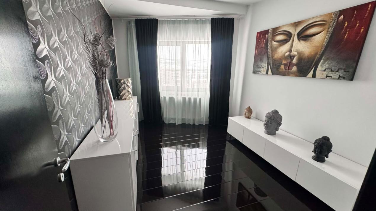 CASA INDIVIDUALA DE INCHIRIAT CU 4 CAMERE,CURTE 500 MP,GARAJ,ZONA VIVO