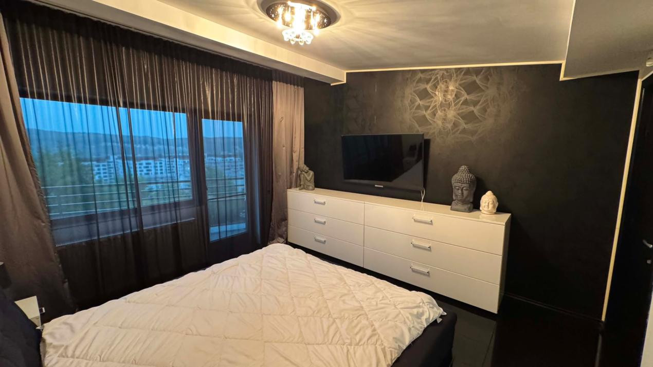 CASA INDIVIDUALA DE INCHIRIAT CU 4 CAMERE,CURTE 500 MP,GARAJ,ZONA VIVO