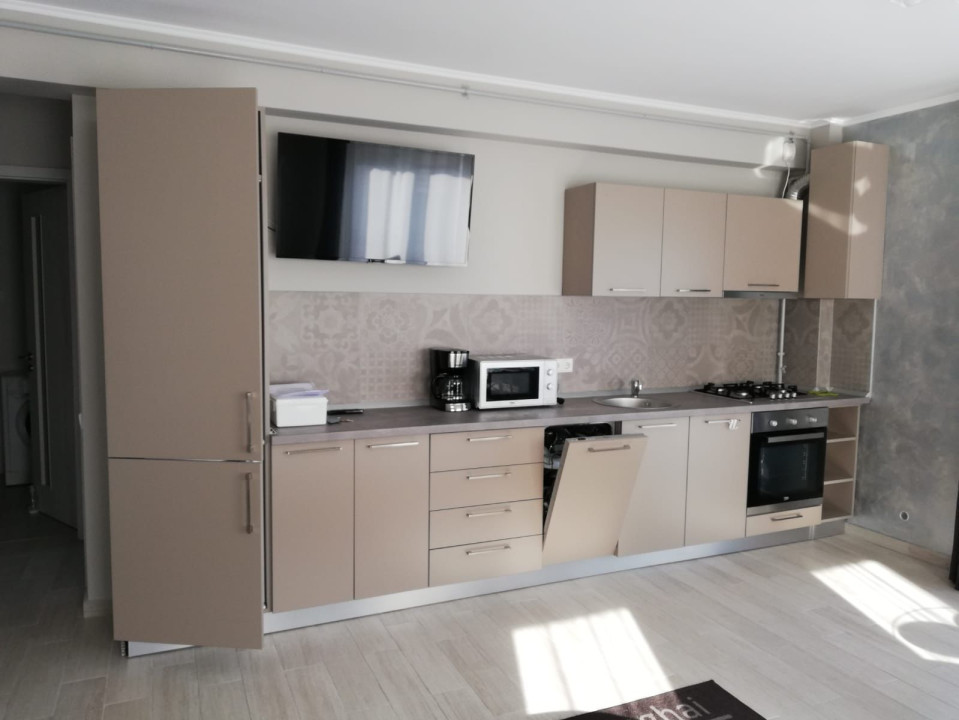 Cladire cu 7 apartamenete,parcari,zona semicentrala