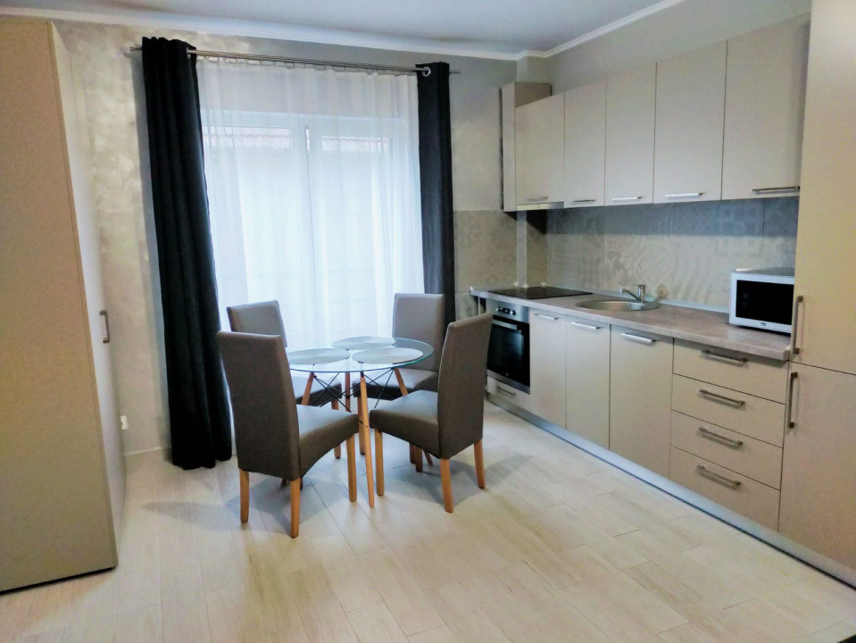 Cladire cu 7 apartamenete,parcari,zona semicentrala
