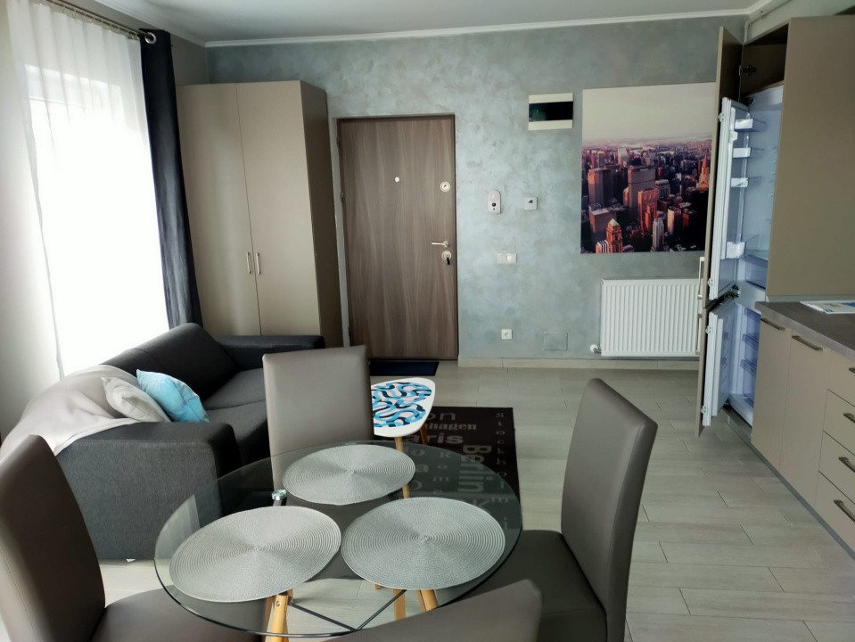 Cladire cu 7 apartamenete,parcari,zona semicentrala