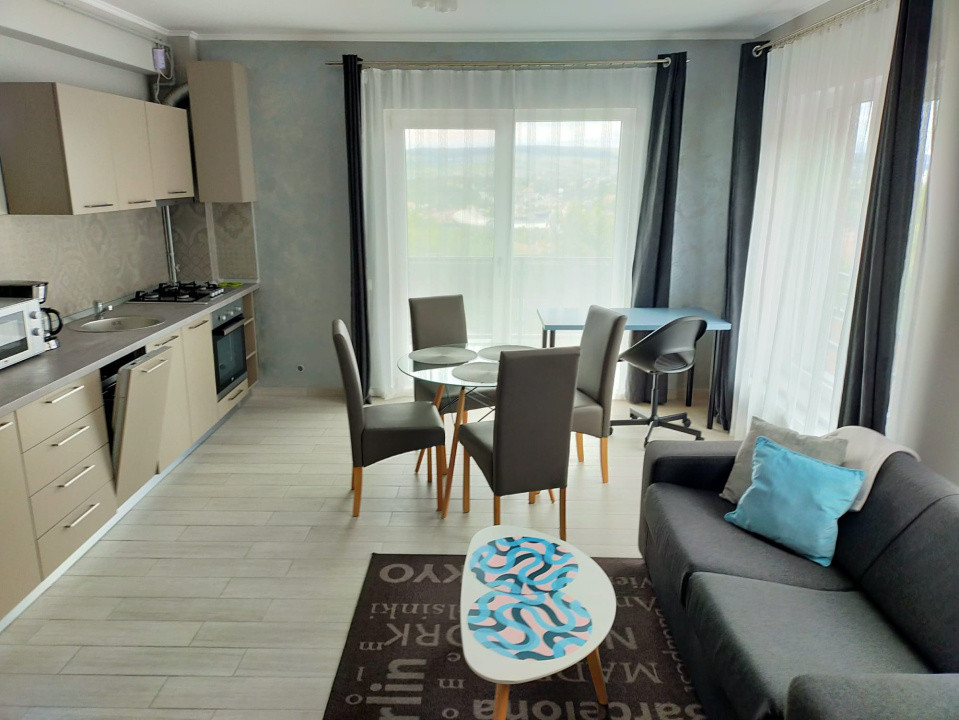 Cladire cu 7 apartamenete,parcari,zona semicentrala