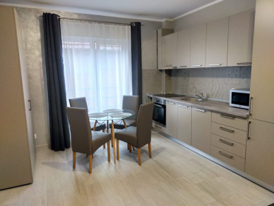 Cladire cu 7 apartamenete,parcari,zona semicentrala