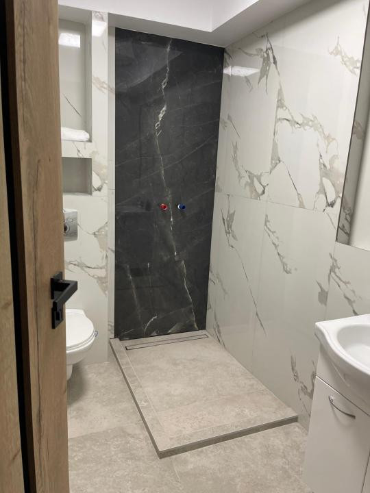 Apartament de 57 mp utili+150 mp grădină ,parcare,zona Tineretului